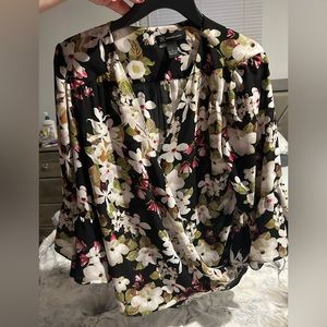 INC bell bottom three quarter bell sleeve. Longer back. Size Large